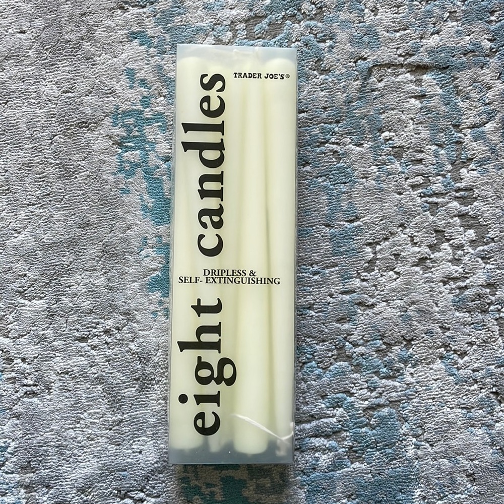 New in box Trader Joe’s Eight Candles “Dripless and Self Extinguishing” in Ivory